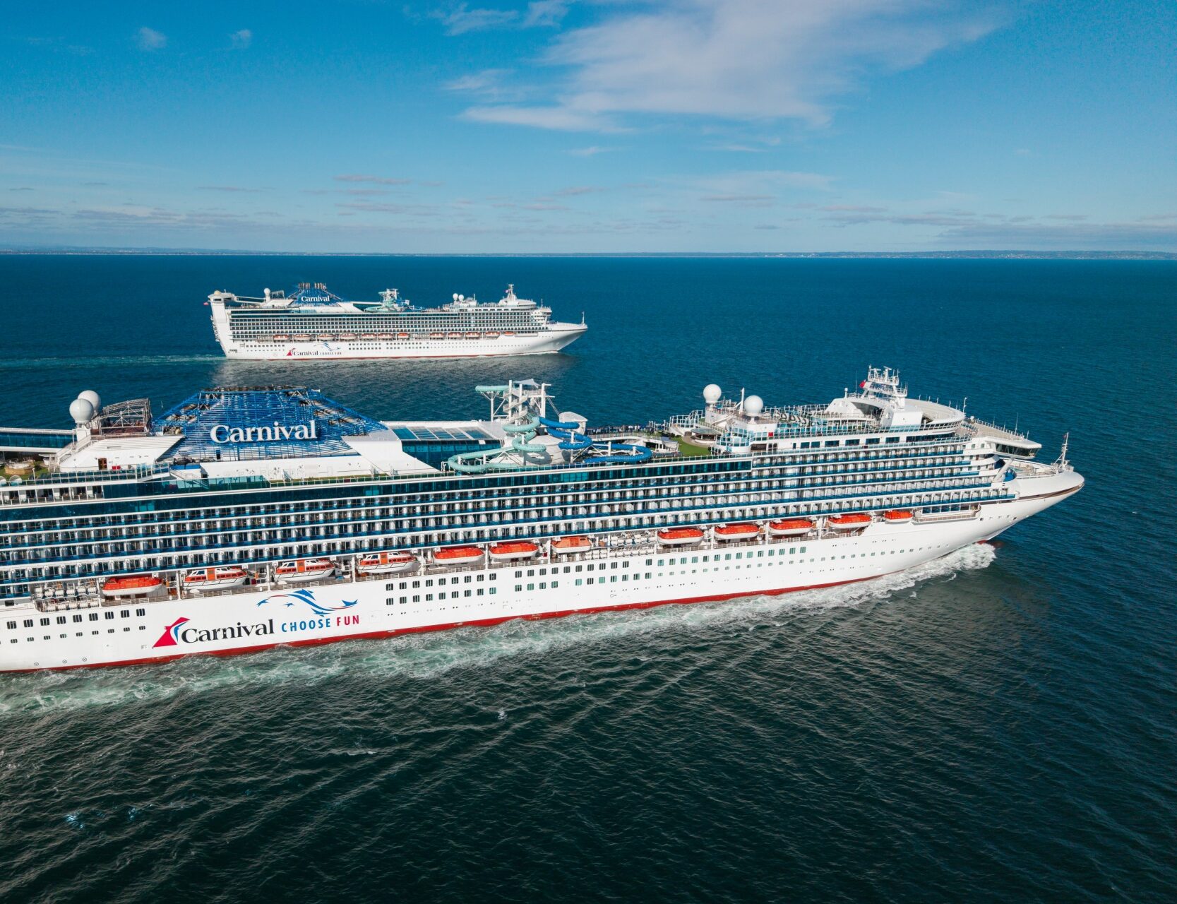 Carnival+Adventure+and+Carnival+Encounter+sail+side+by+side
