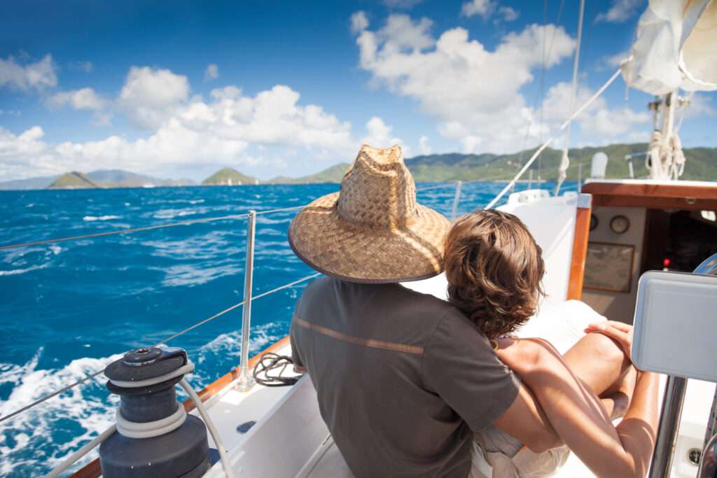 unrecognizable retired couple sailing in the Virgin Islands